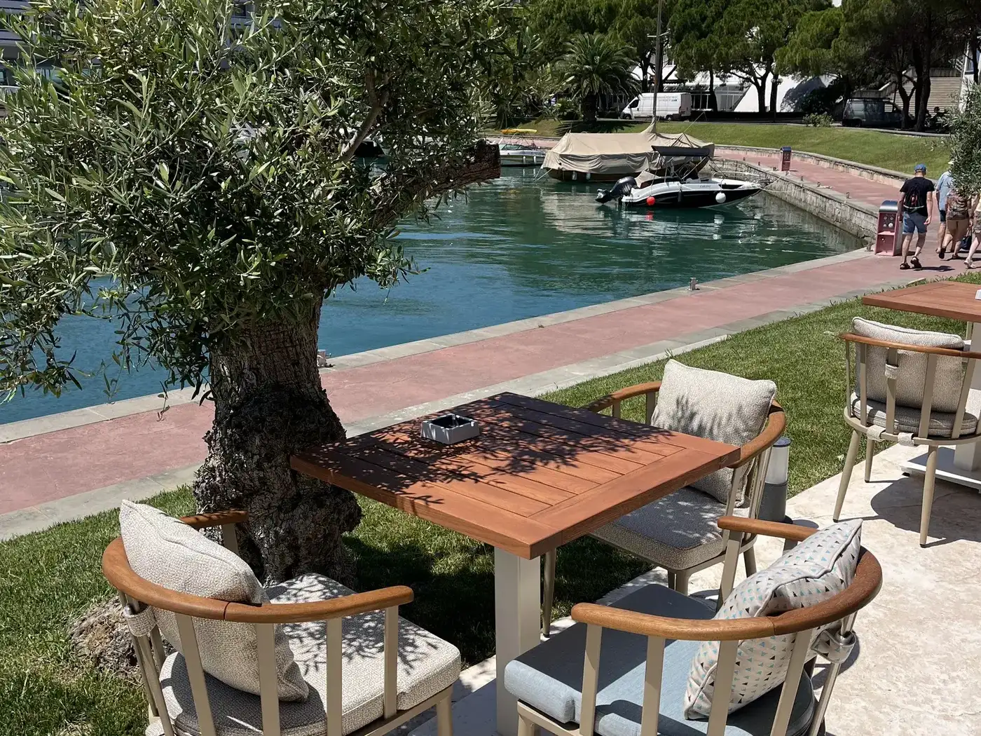 Monument a mare, Portorož — tables set by the sea