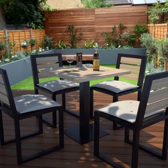 Metal base for a hospitality table