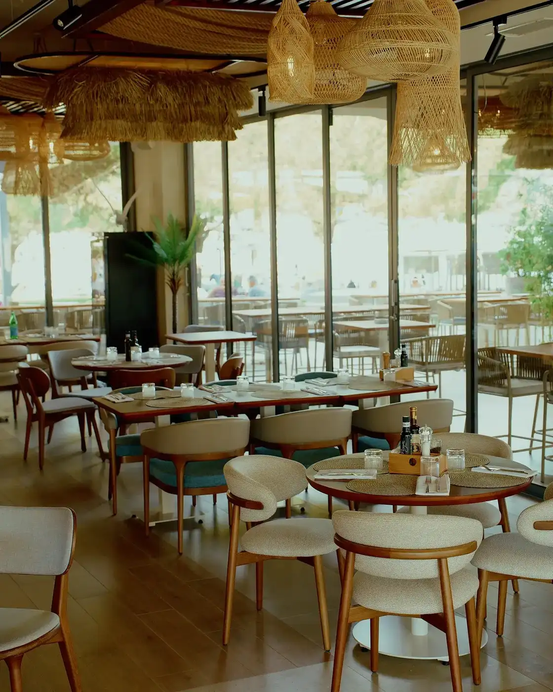 Monument a mare restaurant in Portorož — solid wood tables and chairs