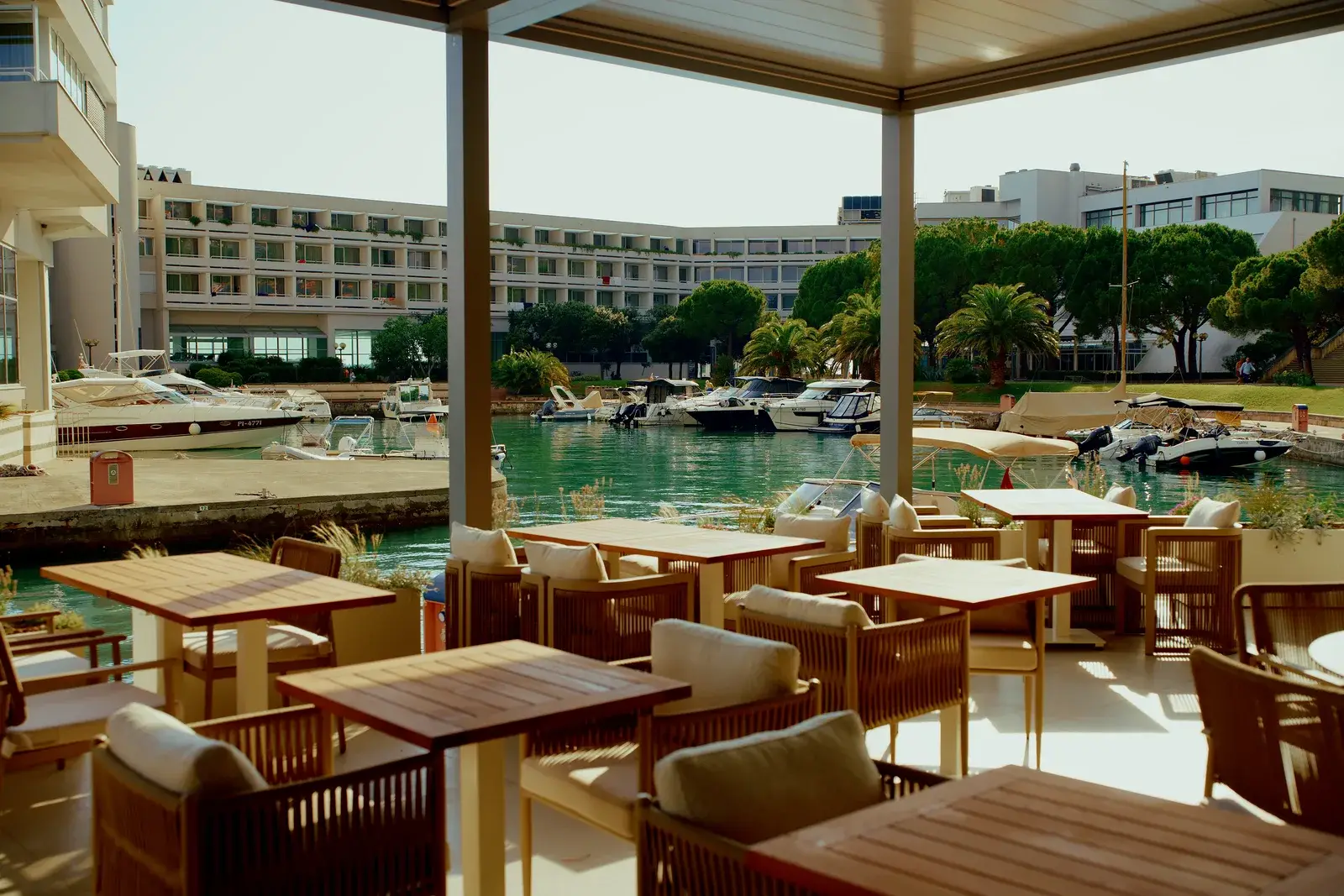 Monument a mare restaurant in Portorož — solid wood tables and chairs