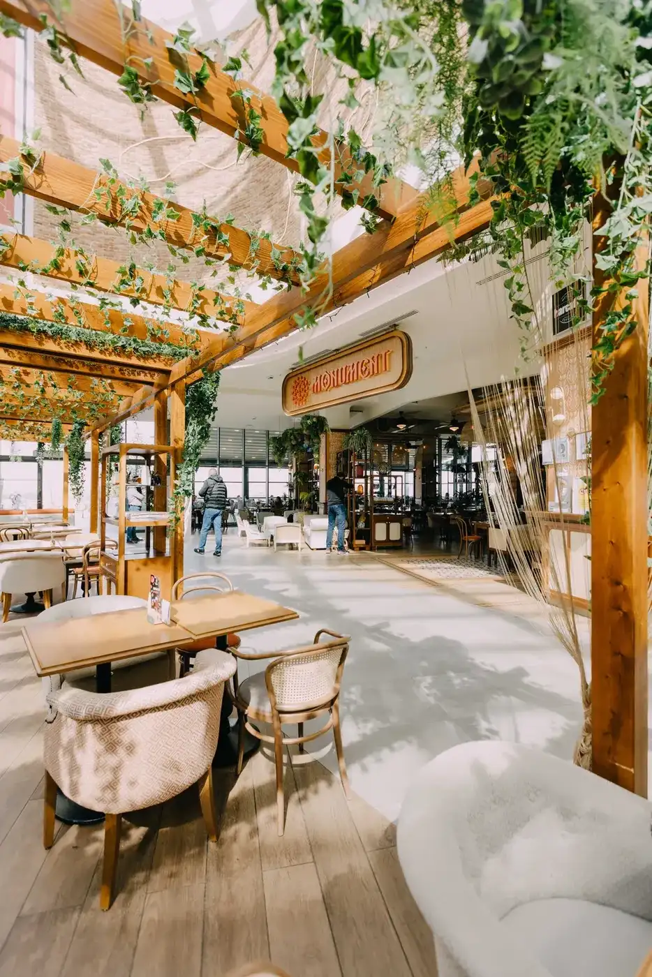 Monument u Ada Mall-u restaurant — interior with solid wood furniture