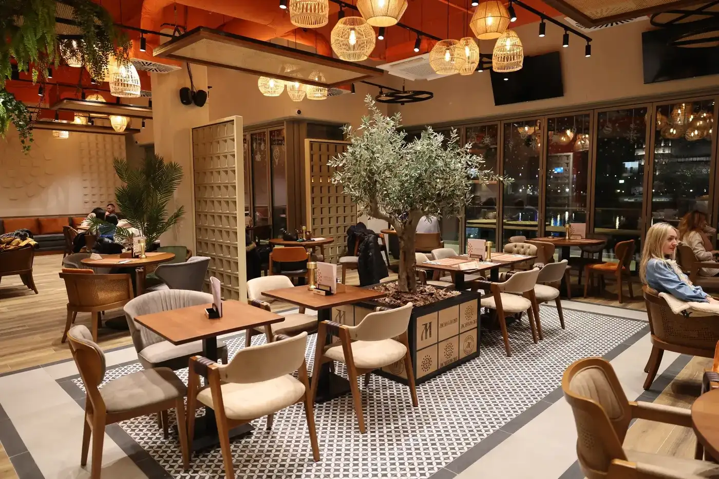 Monument u TC Gallery restaurant — interior with solid wood furniture