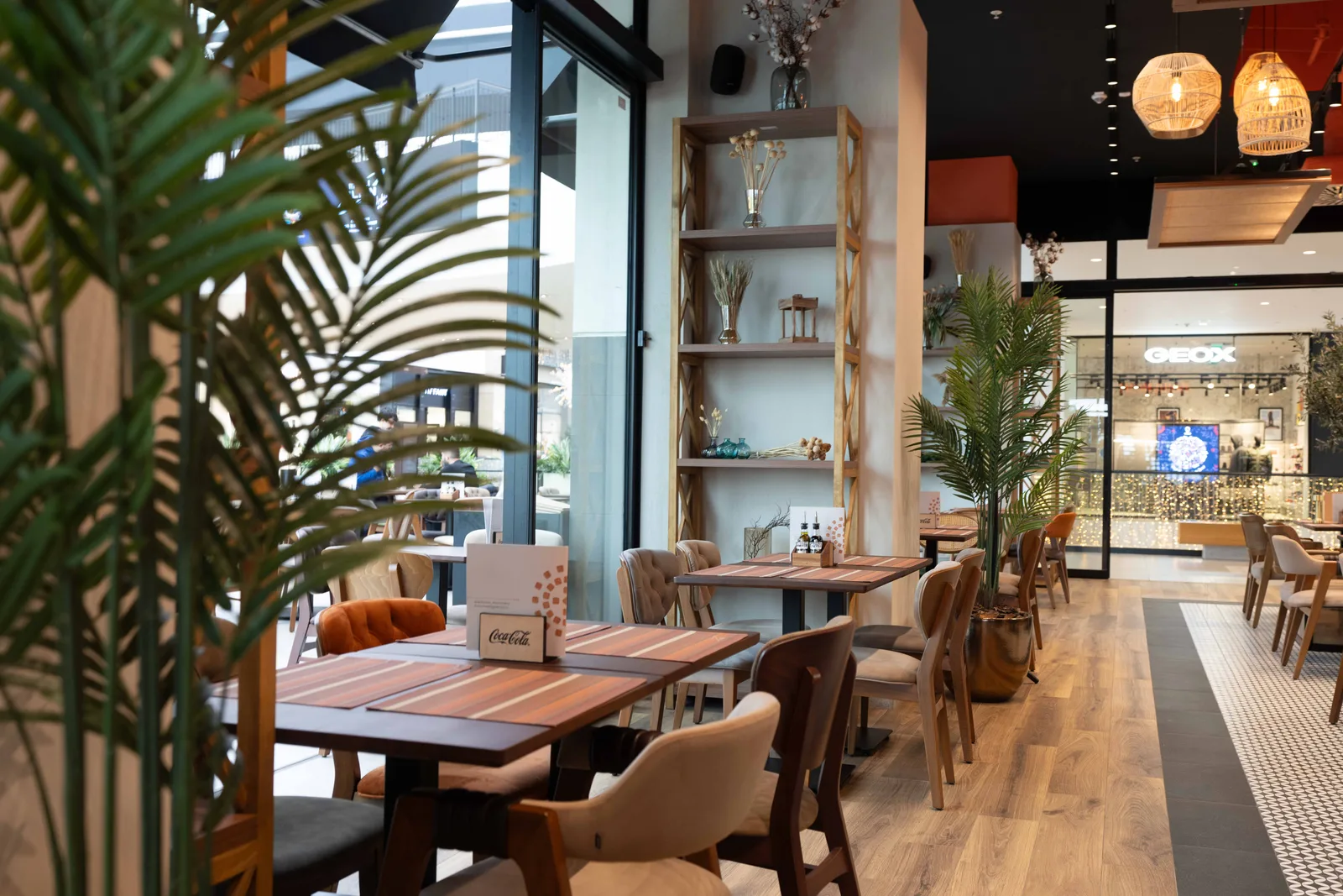 Monument restaurant in the Galerija mall — the dining room in wooden furniture