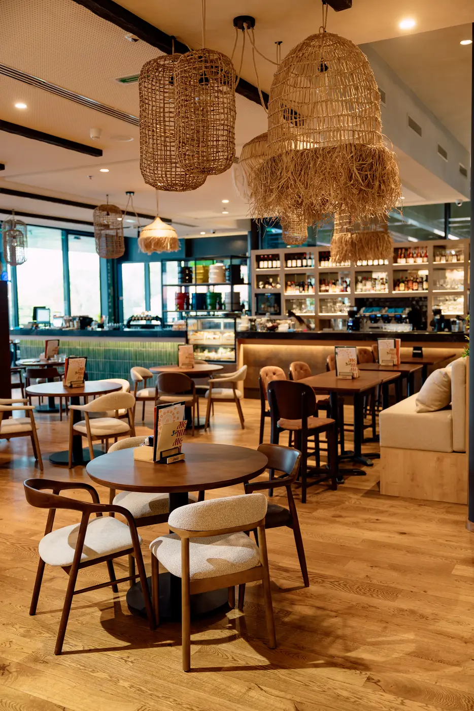 Monument Rajićeva restaurant, furnished by Stiletto Furniture — round table and upholstered chairs